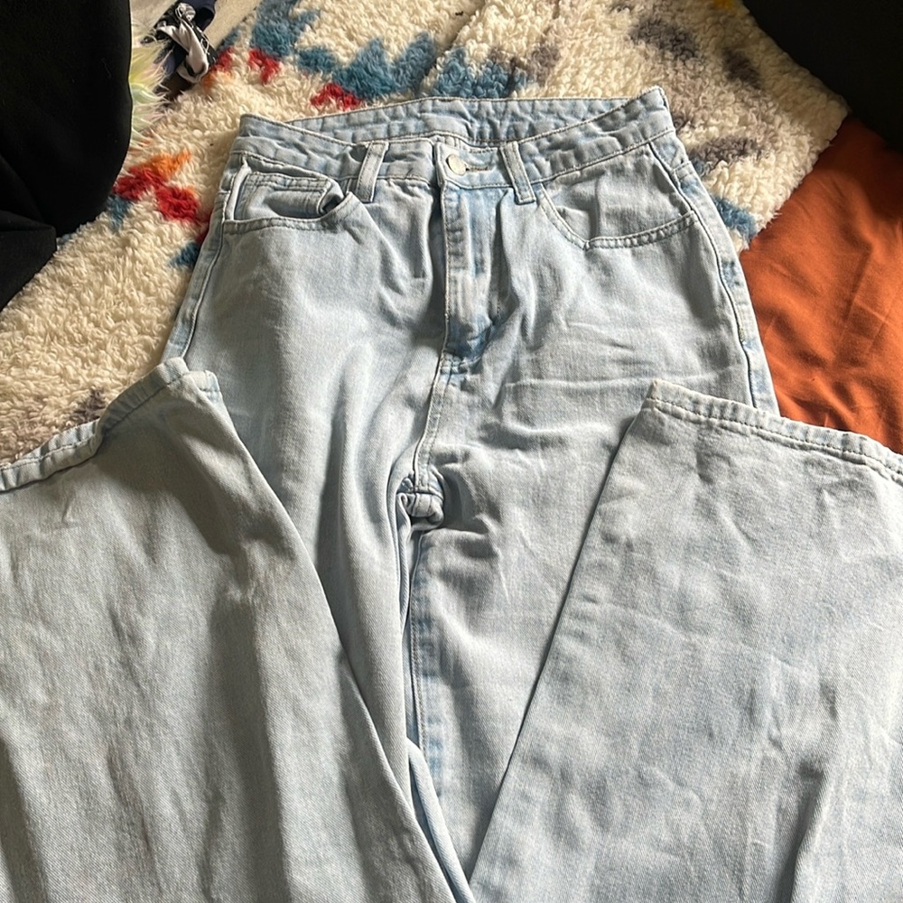 High waisted light blue jeans